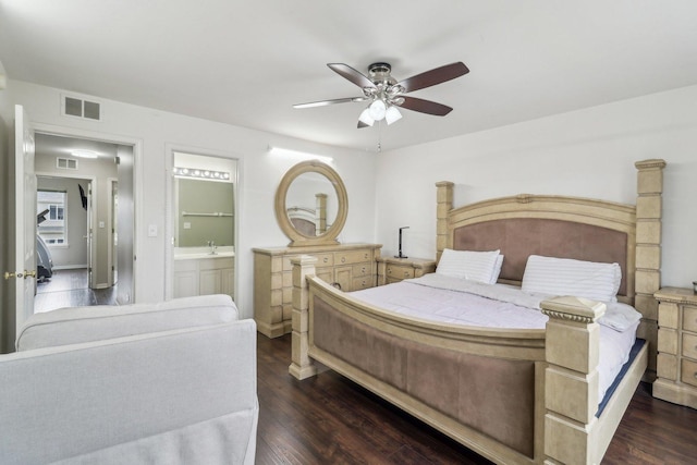 801 S Parkside Dr, Round Lake, IL 60073 - bedroom featuring dark wood-type flooring, a sink, ensuite bathroom, and a ceiling fan