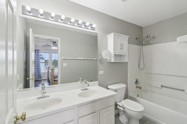 801 S Parkside Dr, Round Lake, IL 60073 - full bath with shower / bathtub combination, double vanity, ensuite bath, toilet, and a ceiling fan