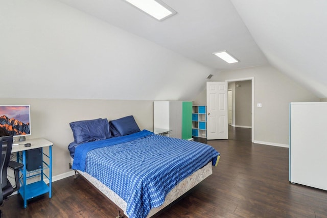 801 S Parkside Dr, Round Lake, IL 60073 - bedroom featuring wood finished floors, vaulted ceiling, and baseboards