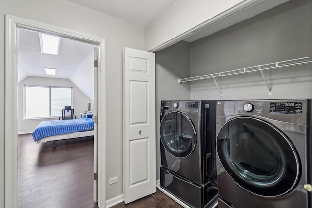 801 S Parkside Dr, Round Lake, IL 60073 - washroom with independent washer and dryer, dark wood-style flooring, and baseboards