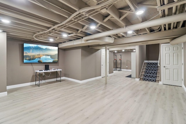 801 S Parkside Dr, Round Lake, IL 60073 - finished basement featuring baseboards, stairs, and wood finished floors