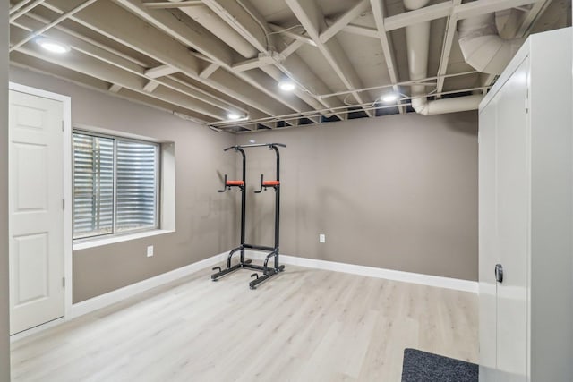 801 S Parkside Dr, Round Lake, IL 60073 - workout area featuring wood finished floors and baseboards