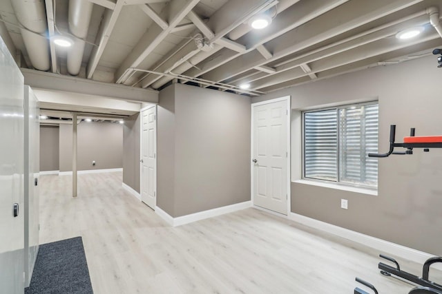 801 S Parkside Dr, Round Lake, IL 60073 - below grade area with wood finished floors and baseboards
