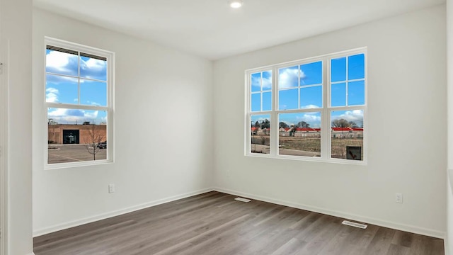 2156 Glacier St, Mundelein, IL 60060 - spare room featuring wood finished floors, baseboards, and recessed lighting