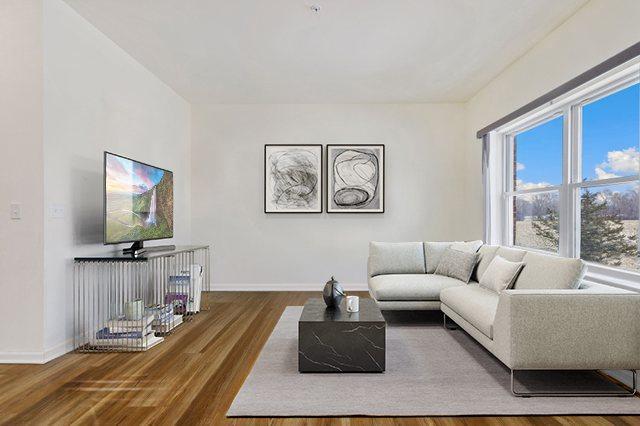 1005 Regent Dr, Matteson, IL 60443 - living room with wood finished floors and baseboards