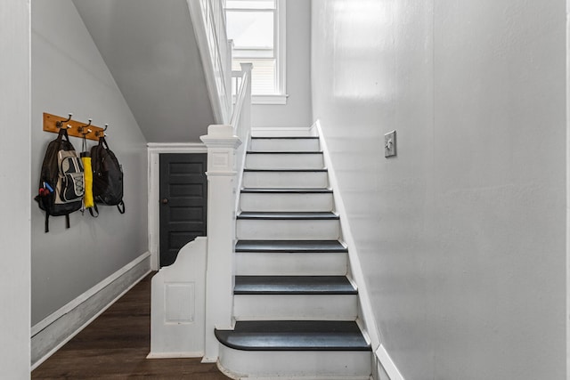 1104 W Church St, Champaign, IL 61821 - stairway with baseboards and wood finished floors