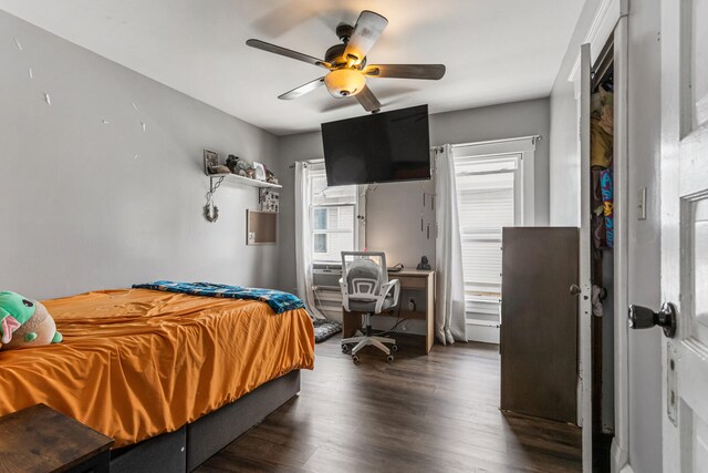 1104 W Church St, Champaign, IL 61821 - bedroom featuring dark wood-style flooring and ceiling fan