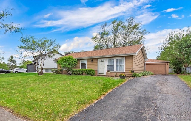 228 Davis Ln, Bolingbrook, IL 60440 - ranch-style home featuring a front lawn and a garage