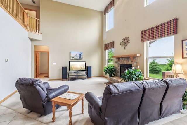 8610 Pebble Creek Ct, Wonder Lake, IL 60097 - living room with a towering ceiling, baseboards, and a fireplace