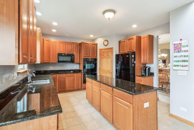 8610 Pebble Creek Ct, Wonder Lake, IL 60097 - kitchen with black appliances, a sink, a kitchen island, dark stone counters, and recessed lighting