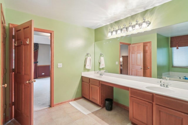 8610 Pebble Creek Ct, Wonder Lake, IL 60097 - full bathroom with double vanity, a bath, and baseboards