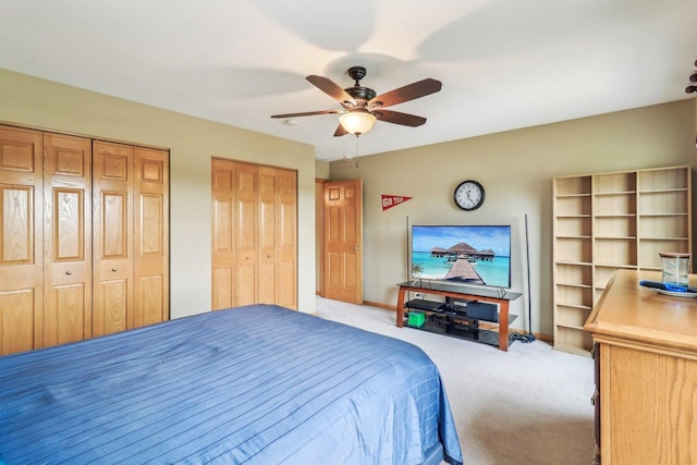 8610 Pebble Creek Ct, Wonder Lake, IL 60097 - bedroom with two closets, carpet flooring, ceiling fan, and baseboards