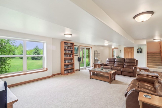 8610 Pebble Creek Ct, Wonder Lake, IL 60097 - living room featuring carpet, stairs, and baseboards