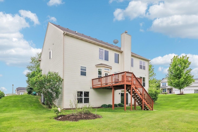 8610 Pebble Creek Ct, Wonder Lake, IL 60097 - back of property with stairs, a wooden deck, a chimney, and a lawn