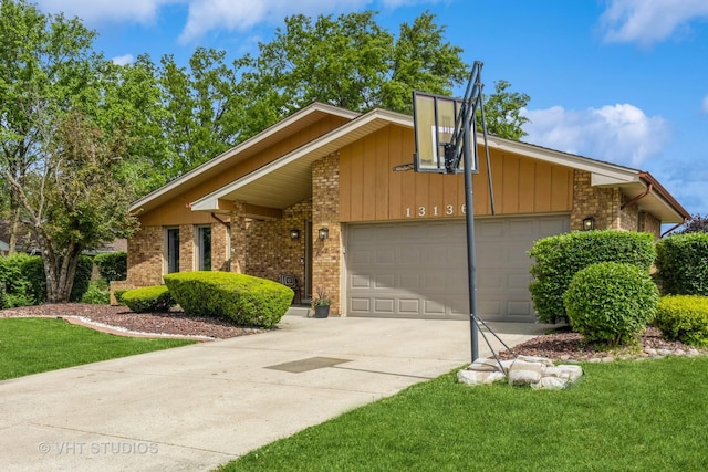 13136 Sage Ct, Homer Glen, IL 60491 - mid-century inspired home featuring brick siding, a garage, driveway, and a front yard