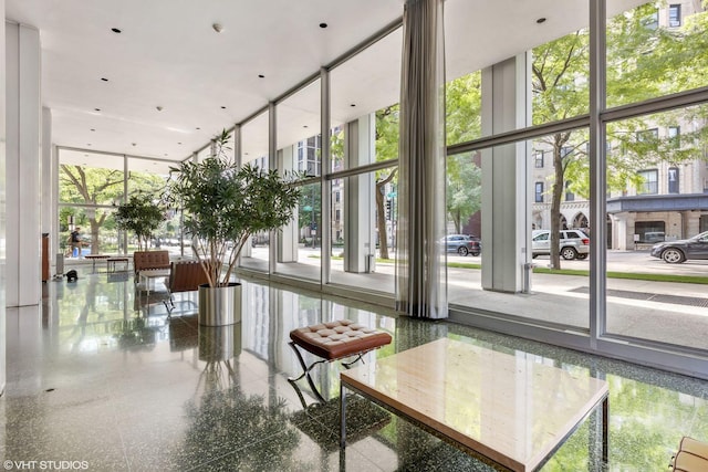 2400 N Lakeview Ave Unit 1108, Chicago, IL 60614 - building lobby featuring a wall of windows and a high ceiling