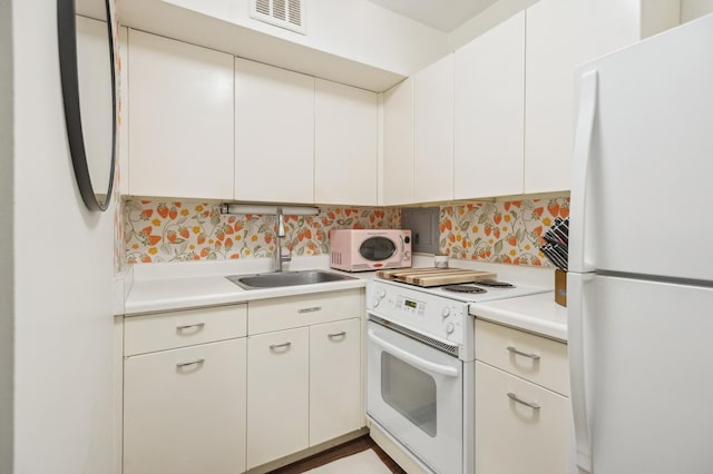 2400 N Lakeview Ave Unit 1108, Chicago, IL 60614 - kitchen with white appliances, a sink, light countertops, and backsplash