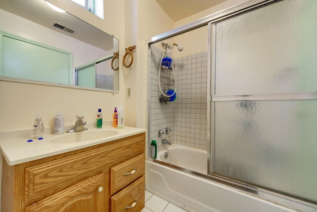 3307 S Wallace St, Chicago, IL 60616 - full bathroom with combined bath / shower with glass door, vanity, and tile patterned flooring