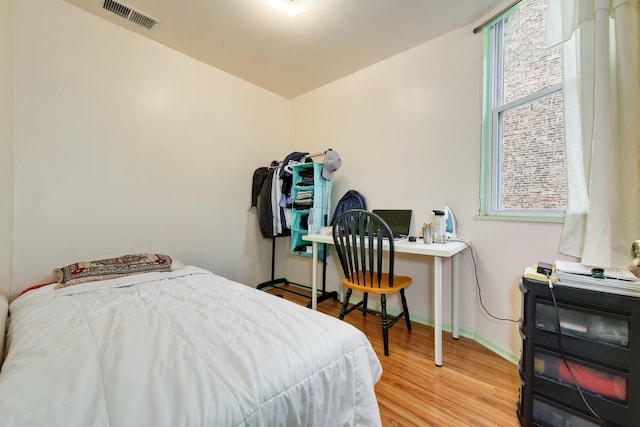 3307 S Wallace St, Chicago, IL 60616 - bedroom featuring light wood-style floors and baseboards
