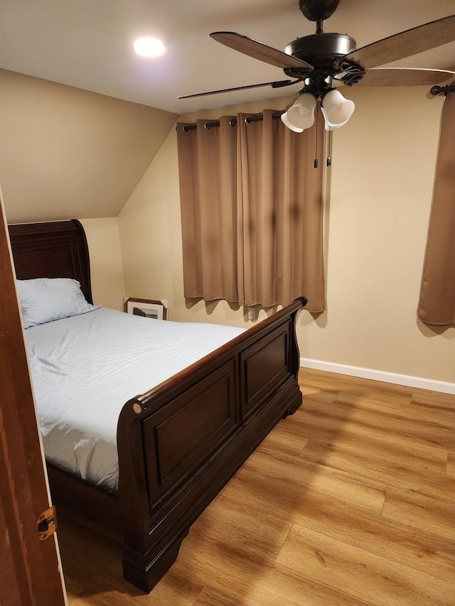 22 Cedar Ln, Putnam, IL 61560 - bedroom with baseboards, light wood-style floors, a ceiling fan, recessed lighting, and lofted ceiling