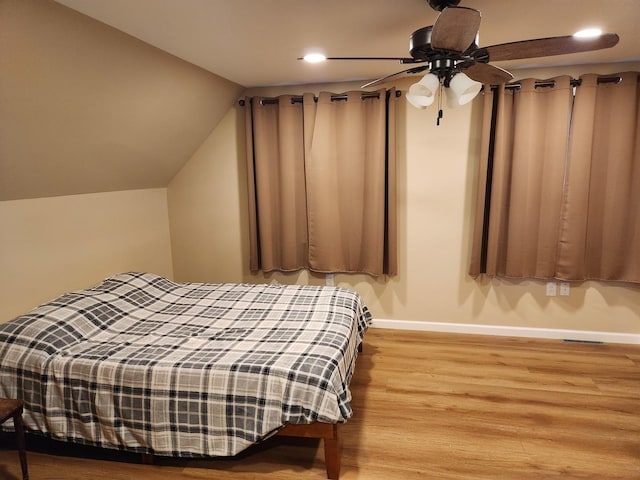 22 Cedar Ln, Putnam, IL 61560 - bedroom featuring baseboards, wood finished floors, recessed lighting, and ceiling fan