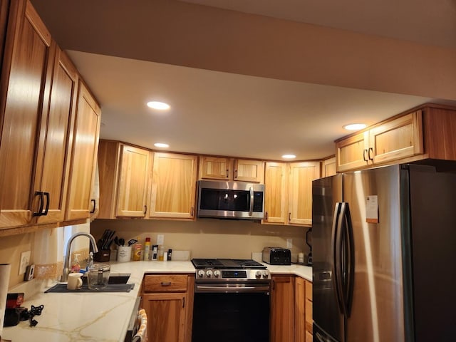 22 Cedar Ln, Putnam, IL 61560 - kitchen featuring stainless steel appliances, a sink, recessed lighting, and light stone countertops