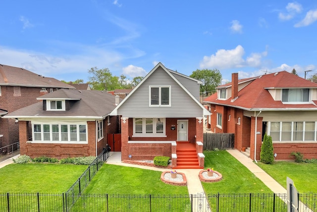 7424 S Euclid Ave, Chicago, IL 60649 - bungalow featuring brick siding and a gate