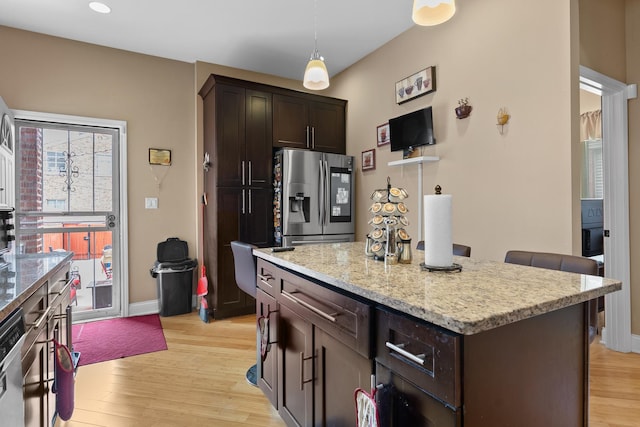 7424 S Euclid Ave, Chicago, IL 60649 - kitchen featuring stainless steel refrigerator with ice dispenser, light wood-type flooring, dark brown cabinets, light stone countertops, and baseboards