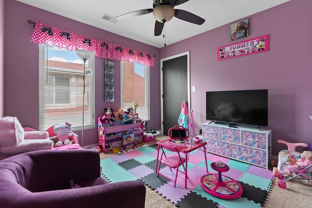 7424 S Euclid Ave, Chicago, IL 60649 - rec room with a ceiling fan, baseboards, and carpet