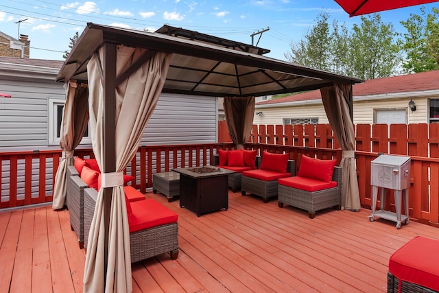 7424 S Euclid Ave, Chicago, IL 60649 - wooden terrace with a gazebo and an outdoor living space with a fire pit