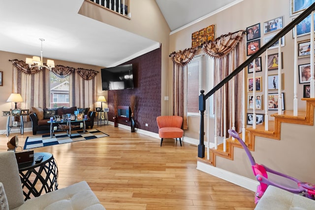 7424 S Euclid Ave, Chicago, IL 60649 - living area with a chandelier, baseboards, stairs, and ornamental molding