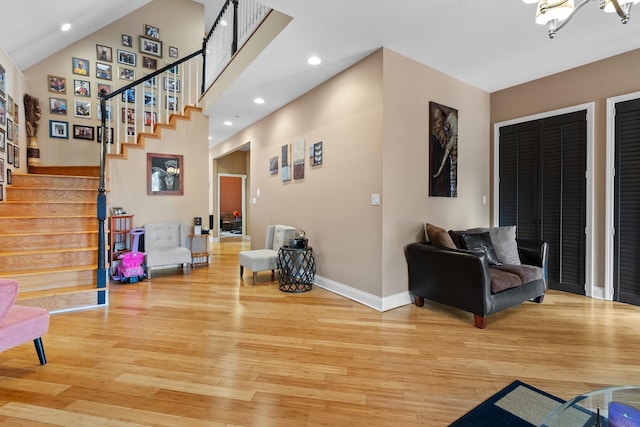 7424 S Euclid Ave, Chicago, IL 60649 - entrance foyer with light wood finished floors, stairs, baseboards, recessed lighting, and a high ceiling