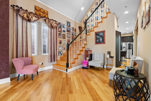 7424 S Euclid Ave, Chicago, IL 60649 - foyer featuring stairs, light wood-style floors, baseboards, and recessed lighting