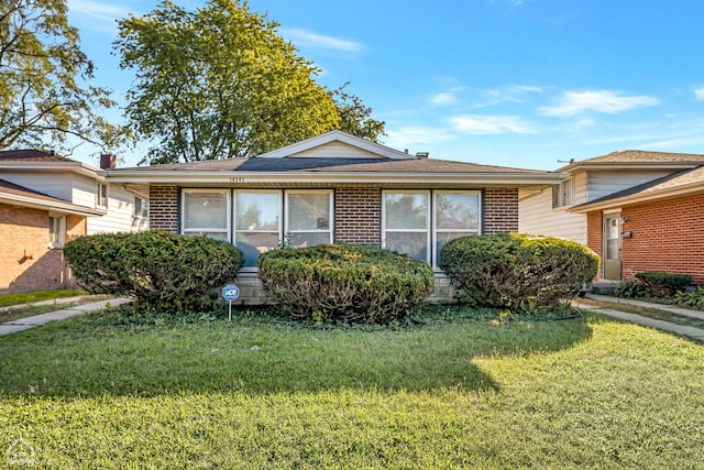14245 Cottage Grove Ave, Dolton, IL 60419 - view of front of home featuring a front yard and brick siding