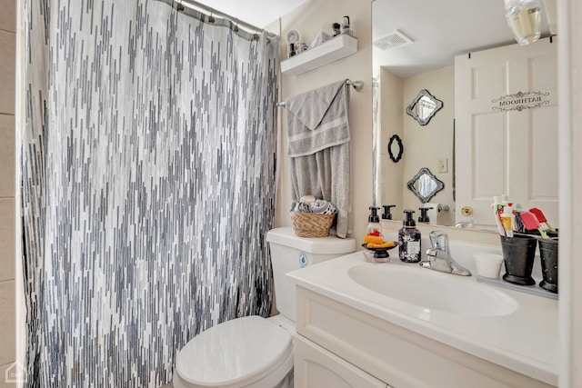 14245 Cottage Grove Ave, Dolton, IL 60419 - bathroom with toilet, vanity, and curtained shower