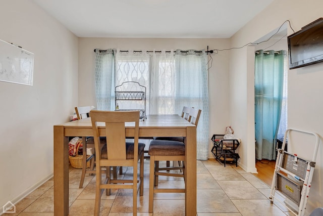 14245 Cottage Grove Ave, Dolton, IL 60419 - dining room with light tile patterned floors and baseboards
