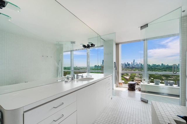 2400 N Lakeview Ave Unit 2803-04, Chicago, IL 60614 - bathroom featuring a view of skyline, vanity, and tile patterned floors