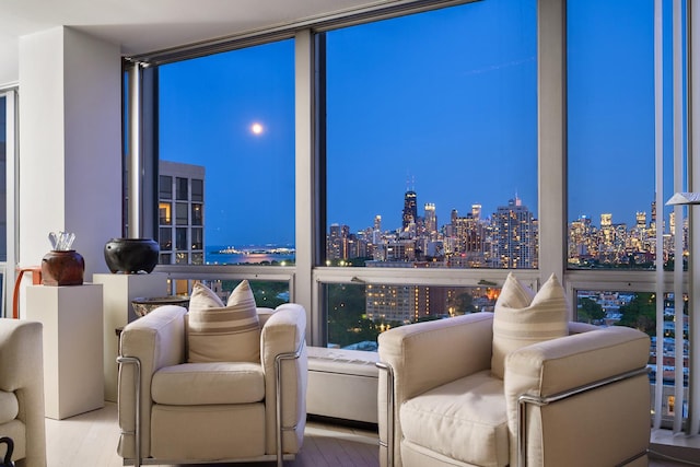 2400 N Lakeview Ave Unit 2803-04, Chicago, IL 60614 - sitting room featuring a view of city lights and wood finished floors