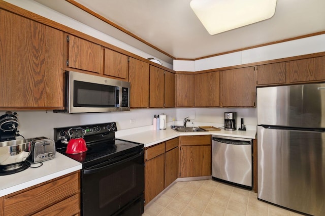 2400 N Lakeview Ave Unit 2803-04, Chicago, IL 60614 - kitchen featuring stainless steel appliances, light countertops, and brown cabinets