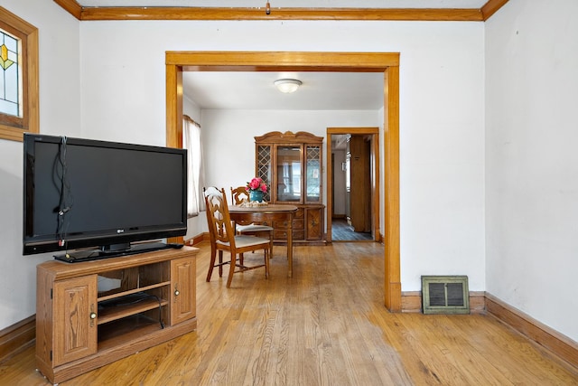 3229 N Oketo Ave, Chicago, IL 60634 - living area featuring light wood finished floors and baseboards