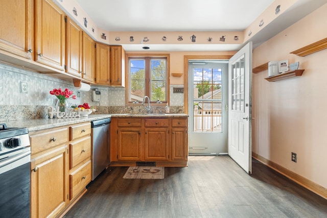 3229 N Oketo Ave, Chicago, IL 60634 - kitchen with appliances with stainless steel finishes, a sink, dark wood-type flooring, decorative backsplash, and light stone countertops