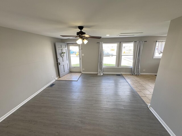 8758 S Corcoran Rd Unit 2, Hometown, IL 60456 - doorway featuring ceiling fan, baseboards, and dark wood-style flooring