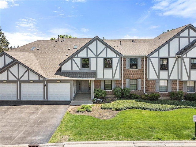 466 Elizabeth Dr Unit 17-C, Wood Dale, IL 60191 - tudor house with driveway, brick siding, and roof with shingles