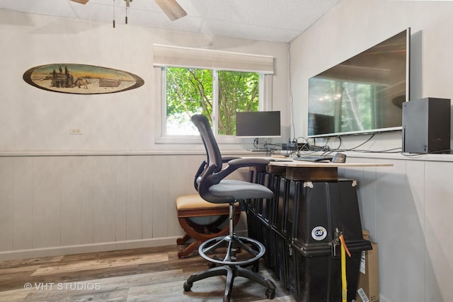 6S024 Westwind Dr, Naperville, IL 60563 - office space featuring wood finished floors, a wainscoted wall, and a ceiling fan