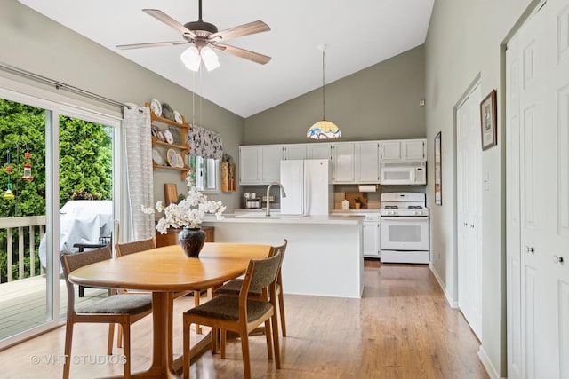 6S024 Westwind Dr, Naperville, IL 60563 - dining room with light wood-type flooring, high vaulted ceiling, and ceiling fan