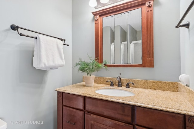 6S024 Westwind Dr, Naperville, IL 60563 - bathroom featuring vanity and a shower with shower door