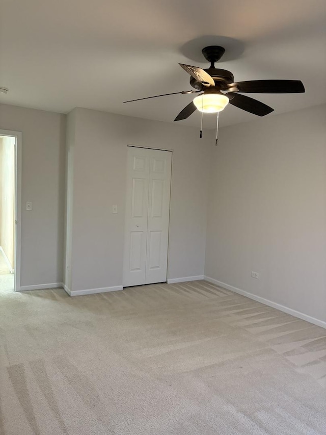 2804 Misty Brook Ln, Joliet, IL 60432 - spare room with light colored carpet, ceiling fan, and baseboards
