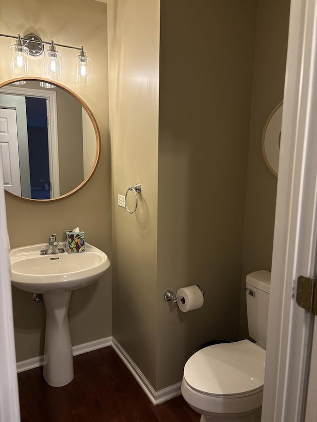 2804 Misty Brook Ln, Joliet, IL 60432 - half bathroom with toilet, wood finished floors, and baseboards