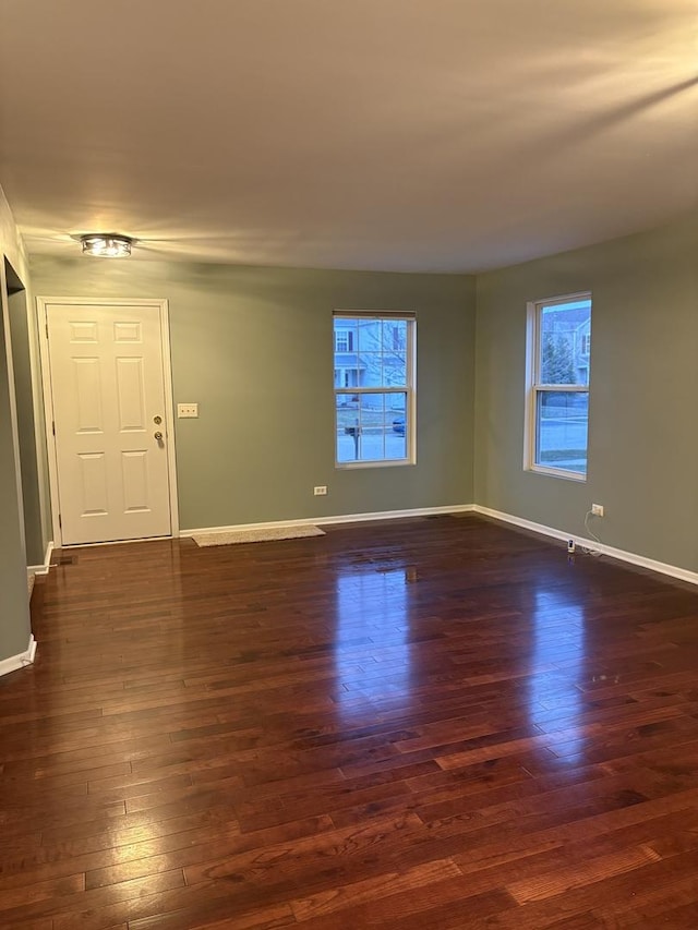 2804 Misty Brook Ln, Joliet, IL 60432 - empty room featuring dark wood-style floors and baseboards