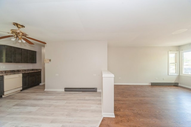 948 Carney Ave, Waukegan, IL 60085 - unfurnished living room with a baseboard heating unit, light wood finished floors, ceiling fan, and baseboards